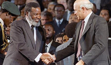 Dr Sam Nujoma shaking hands with South African president, FW de Klerk